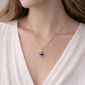 Colgante Ojo Turco: Talismán de Luz & Blindaje Dorado